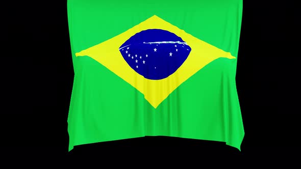 The piece of cloth falls with the flag of the State of Brazil to cover the product
