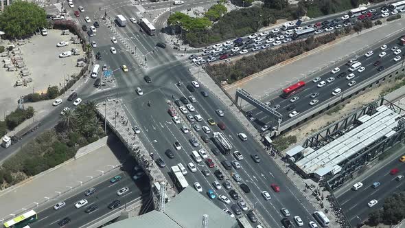Cars drive on the roads in Tel Aviv. The highways are filled with cars