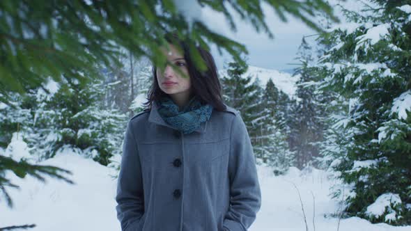 Girl and snowy trees alt