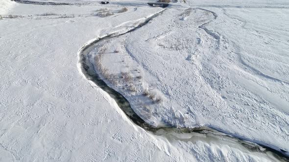 Frozen River in Winter