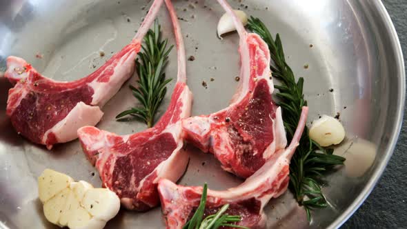 Beef chops and ingredients in the plate