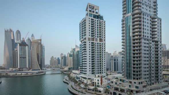 Beautiful Aerial Top View Day to Night Transition Timelapse of Dubai Marina Canal