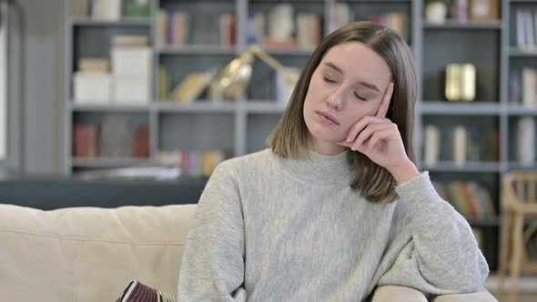 Portrait of Exhausted Young Woman Sleeping