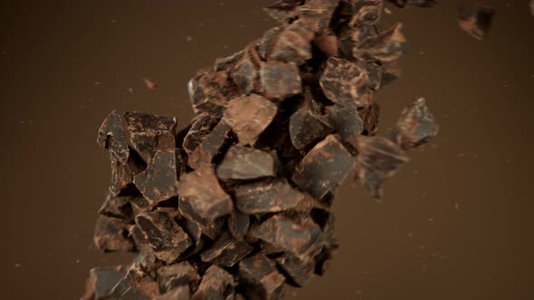 Super Slow Motion Shot of Raw Chocolate Chunks Side Crashing at 1000 Fps.