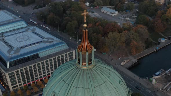 Panning Aerial View of City Park and Buildings on Riverbank