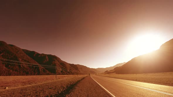 Mountain Road Timelapse at the Summer or Autumn Sunset Sunrise Time