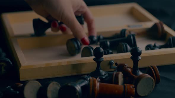 Close Up of Wooden Chess in Chessboard and Near It