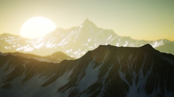 Winter Landscape in Mountains at Sunset