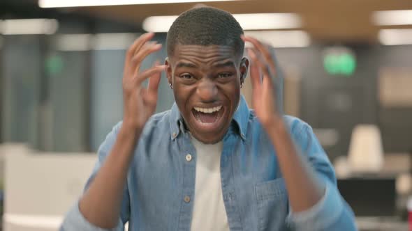 Attractive Young African American Man Screaming Shouting