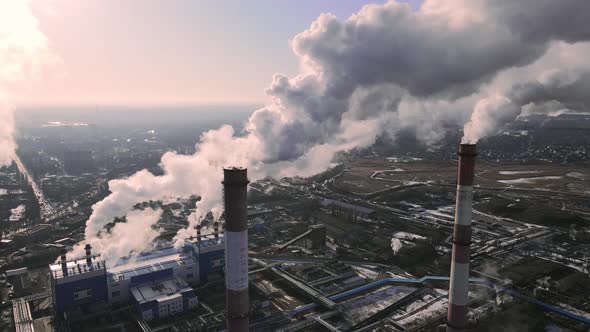 Factory emissions of smoke from factory pipes in indistrial zone