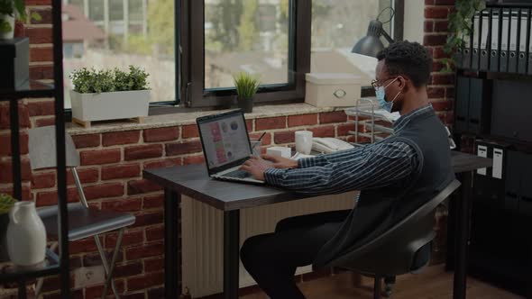 Business Man Working on Company Investment in Startup Office