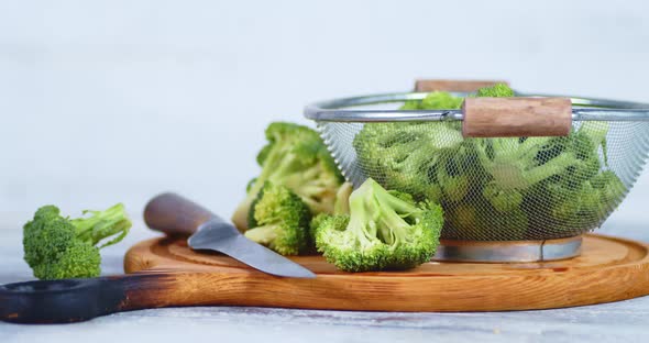 Rotating Fresh Broccoli on a Cutting Board