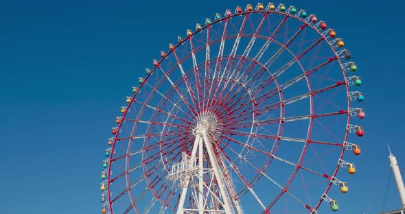 Ferris Wheel with clear blue sunny sky