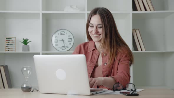 Caucasian Young Business Woman Girl Student Working at Computer Sitting in Office at Table Uses