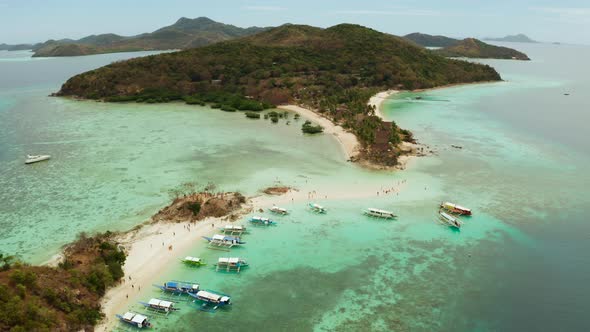 Small Torpic Island with a White Sandy Beach, Top View.