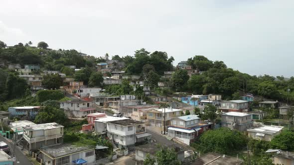 Drone shot up hill of Puerto Rican Neighborhood shot in 4k 24p