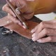  craftsman when carving leather for decoration - VideoHive Item for Sale