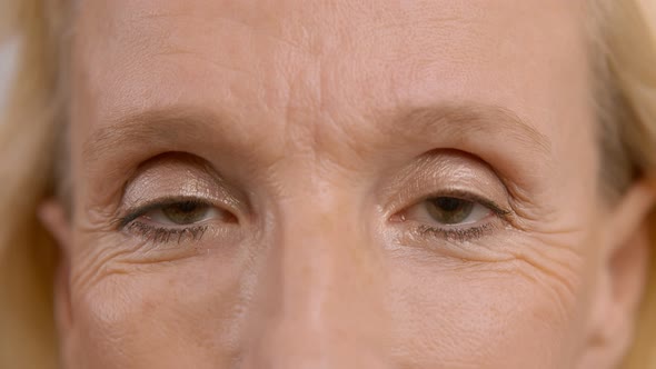 Close Up On Eyes Of Serious Mature Woman 