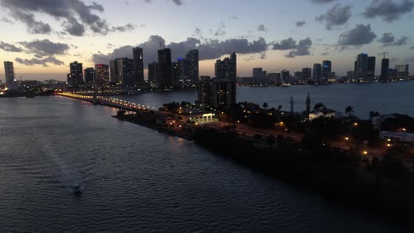 Venetian Causeway And Miami Downtown Skyline At Sunset Lights On Aerial