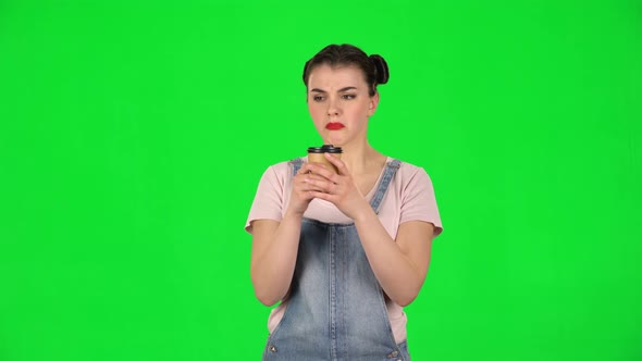 Girl Drinks Unpalatable Coffee and Is Disgusted on Green Screen