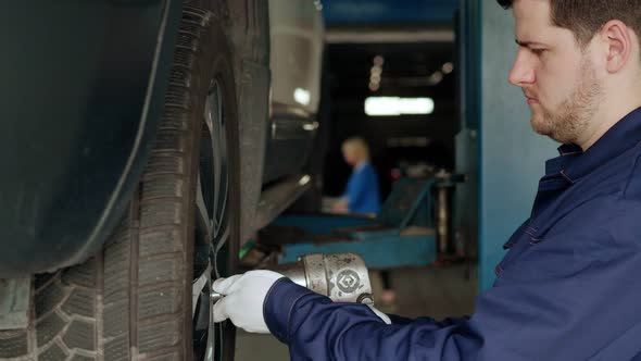 Car Wheel Repair in a Car Workshop