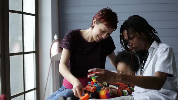 Smiling Interracial Family Enjoying Time Together