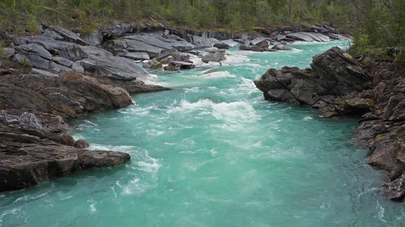 Drone move above  mountain river Glomaga, Marmorslottet, Mo i Rana,Norway