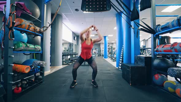 Active young female at fitness center.