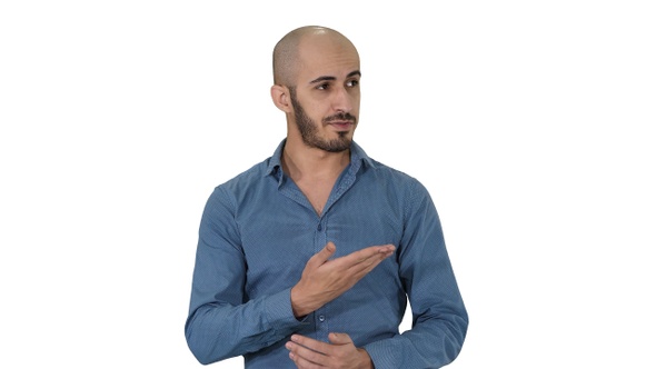 Arabic young man in shirt talking presenting something