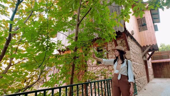 Tourist Girl Taking Selfie In Historic Street