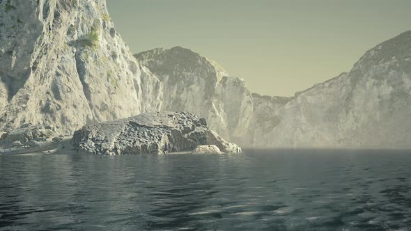 Rocky Ocean Coast with Mountains and a Beautiful Sand Beach