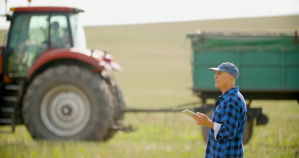 Farmer Using Digital Tablet Agriculture