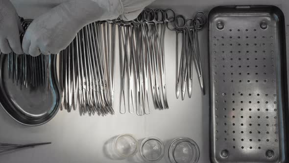 Nurse Preparing Sterile Surgical Instruments Healthcare Worker Prepares Tools