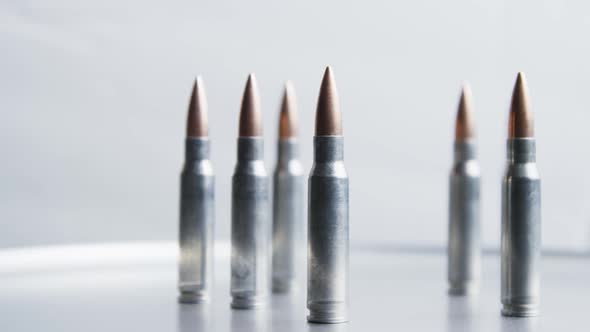 Cinematic rotating shot of bullets on a metallic surface - BULLETS 022