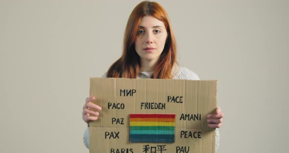 Ukrainian Girl Holding an Antiwar Placard in Her Hand