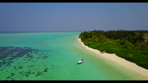 Aerial top down nature of relaxing resort beach voyage by clear ocean with white sandy background of