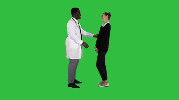 Doctor telling good news to a patient on a Green Screen