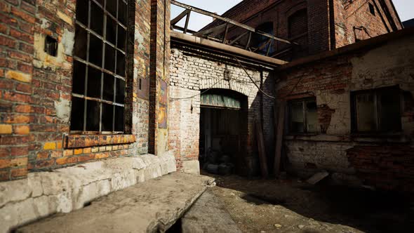 Abandoned Industry Buildings at Sunset alt