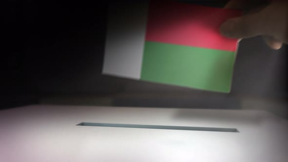 Compositing Hand Voting To Flag OF Madagascar