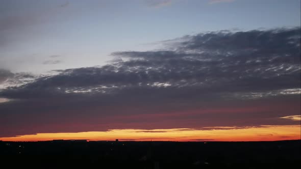 Bright Orange Sky and Light of the Sun in City