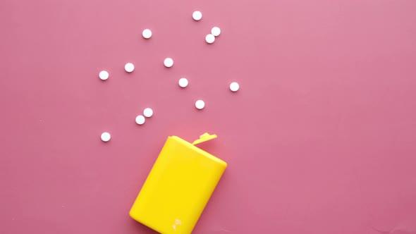 Artificial Sweetener Container on Red Background