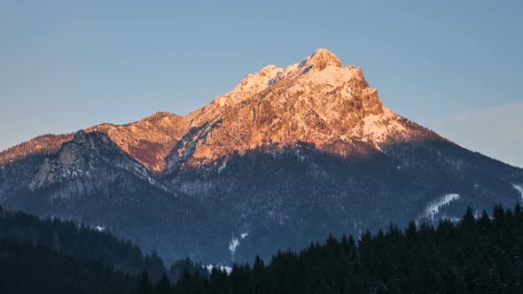 Sunset over Alpine Peak in Winter