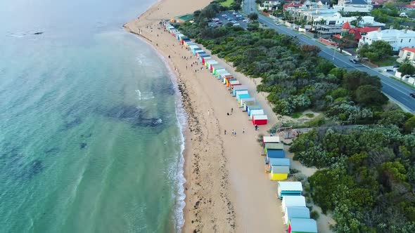 Brighton Beach Boxes aerial tilt up to reveal Melbourne City Skyline
