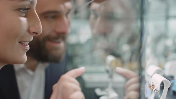 Couple Choosing Precious Gemstone Set