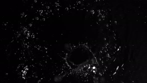 Super Slow Motion Shot of Splashing Water on Black Background at 1000Fps.