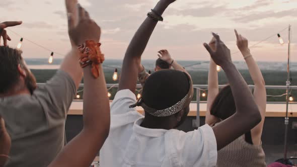 DJ Playing Set at Rooftop Party