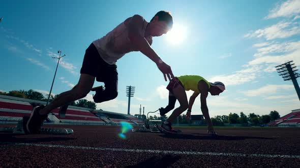 Running Start Held By Two Disabled Sportsmen