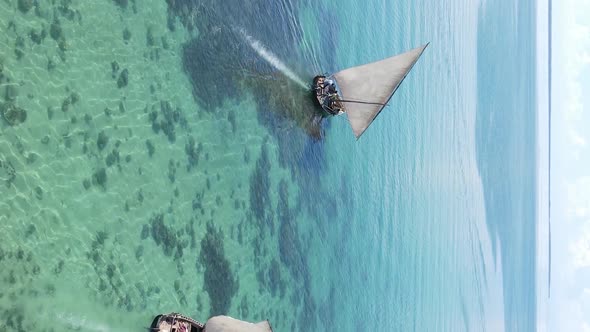 Tanzania Vertical Video  Boat Boats in the Ocean Near the Coast of Zanzibar Aerial View