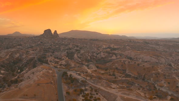 Beautiful Sunset with Panoramic Aerial Drone View on Uchisar Castle Near Goreme Capadoccia Turkey