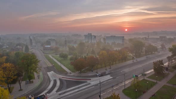 Sunrise Over Road Intersection with Reconstructed Tram Tracks Aerial Panoramic Timelapse